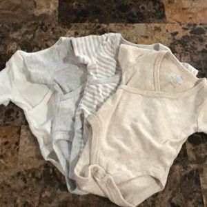 Bundle of 4 newborn onesies